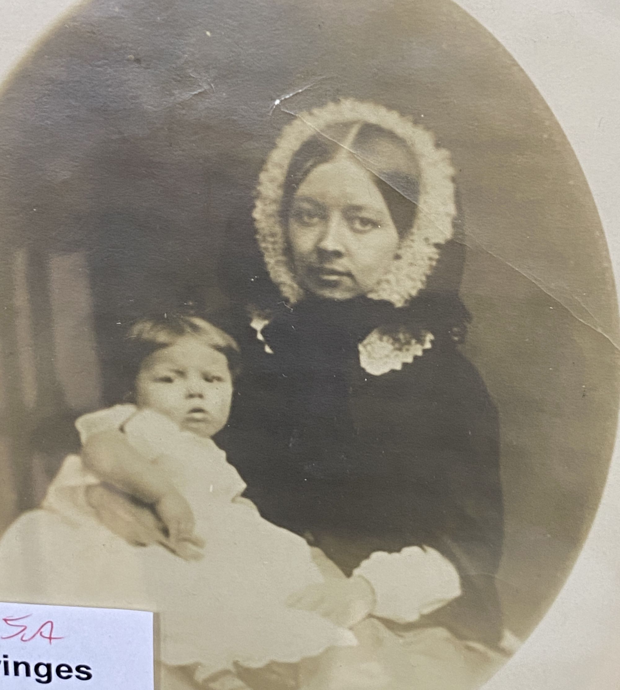 A Victorian framed photograph portrait of a mother and child